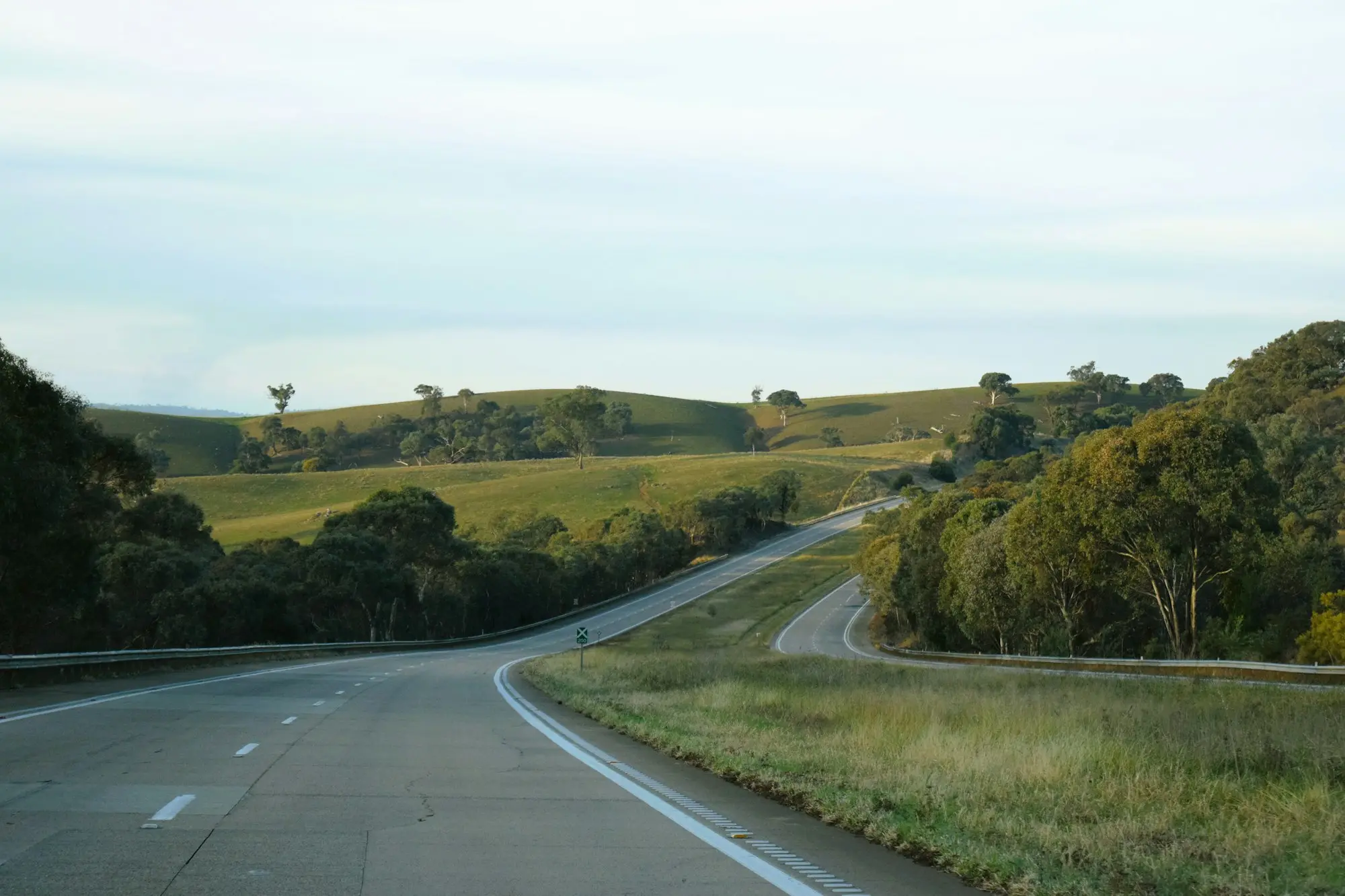 Winding highway through green hills in regional New South Wales